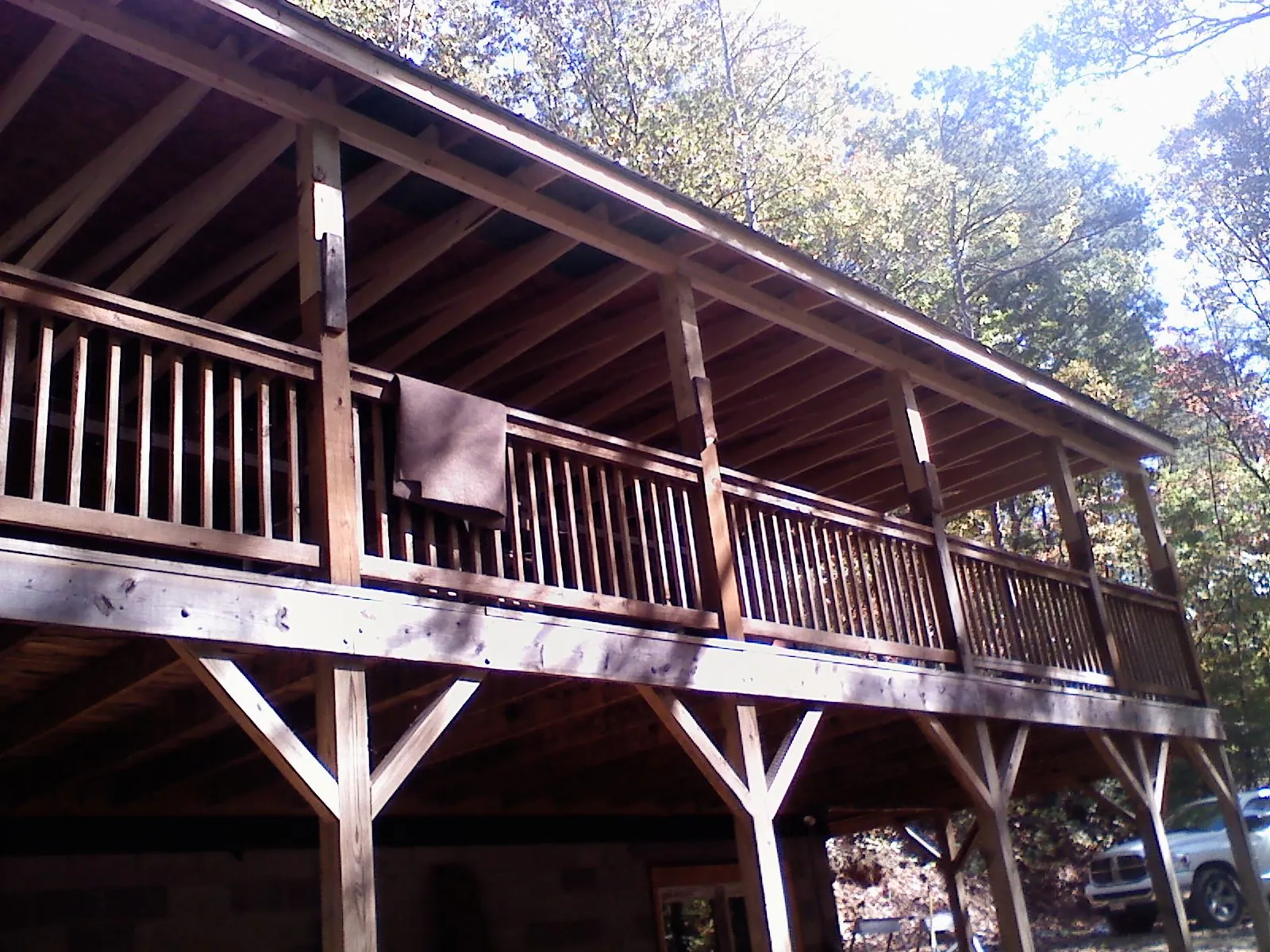 Timber framing under a new elevated porch and deck — Roof Leak Repair in Studio City by Roofing Brothers